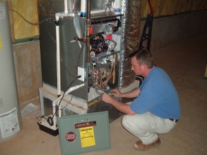 tehnician performing heat maintenance
